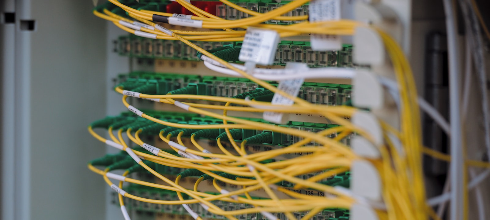 Rows of servers in a data center aisle