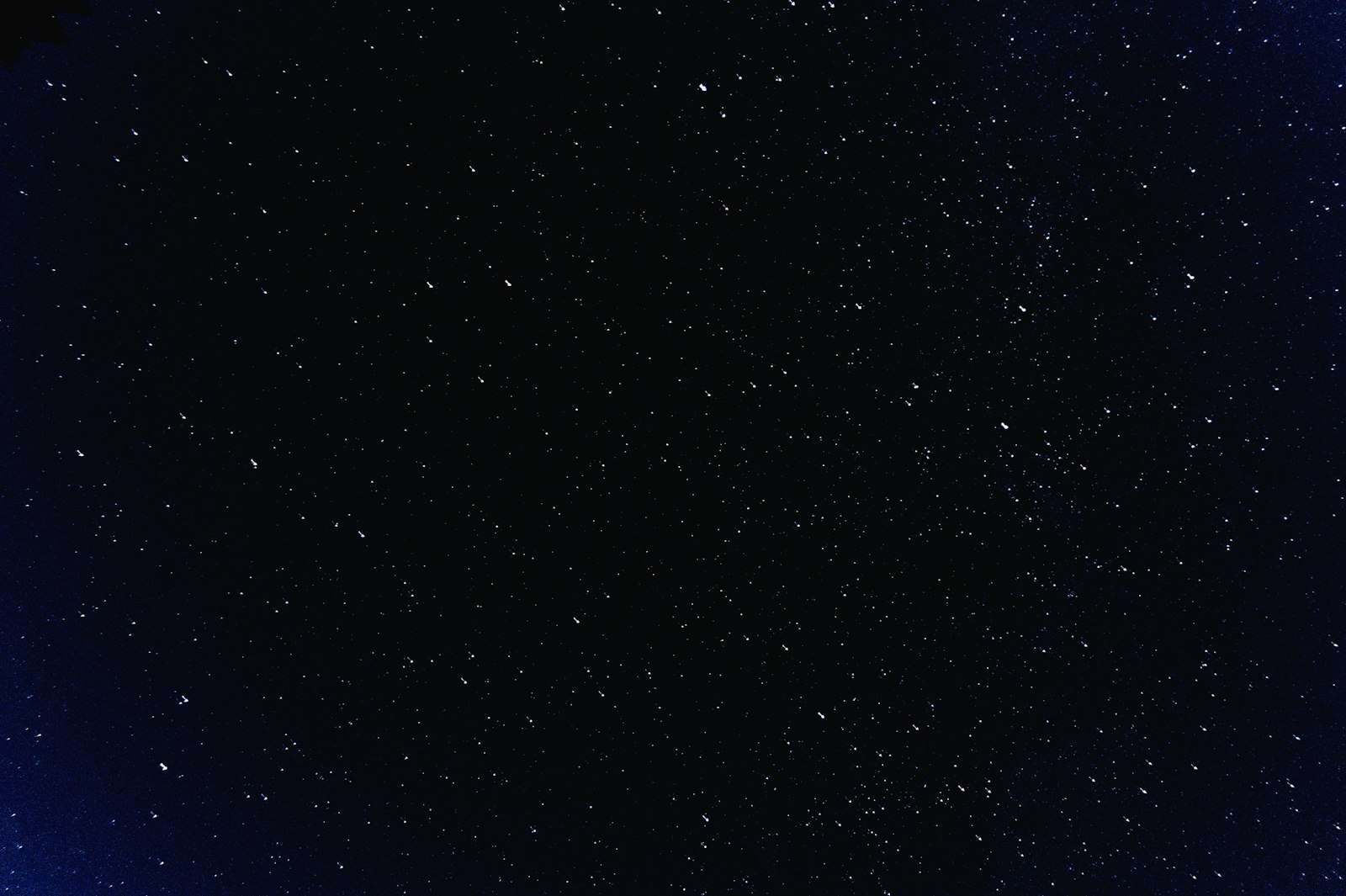 A star field at night: thousands of points, the nearest ones forming patterns